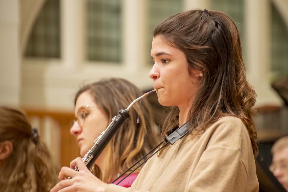 RCM student playing cor anglais in rehearsal